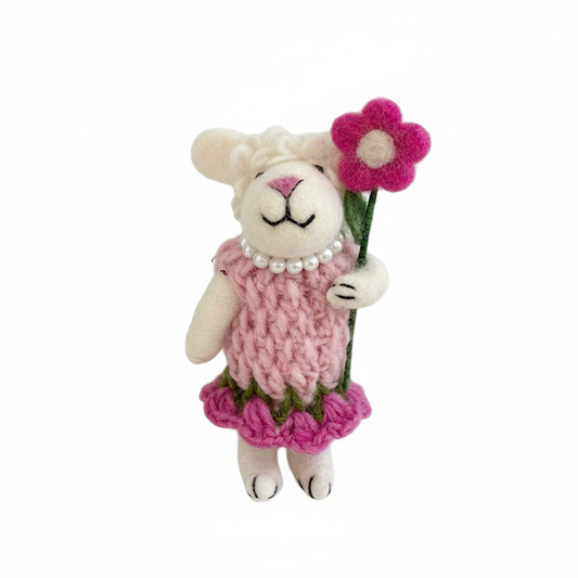 Blush pink wool felt lamb charm on white background - handcrafted pendant detail

