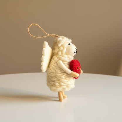 Side view of angel heart wool felt lamb pendant - handcrafted ornament charm
