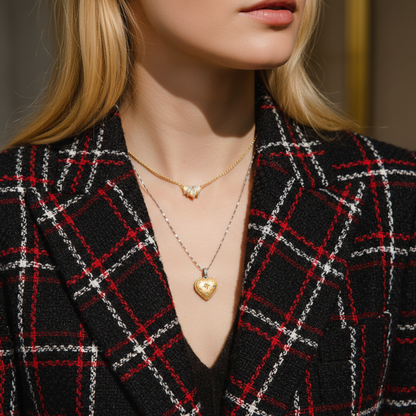 Woman wearing S925 sterling silver heart necklace - lifestyle photo showing reversible 18K gold pendant
