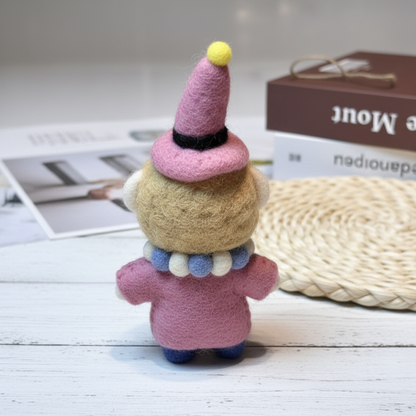 Back view of handmade wool felt clown charm showing felt construction
